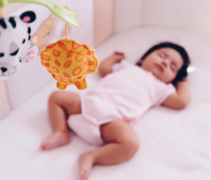 transitioning baby from swing to crib